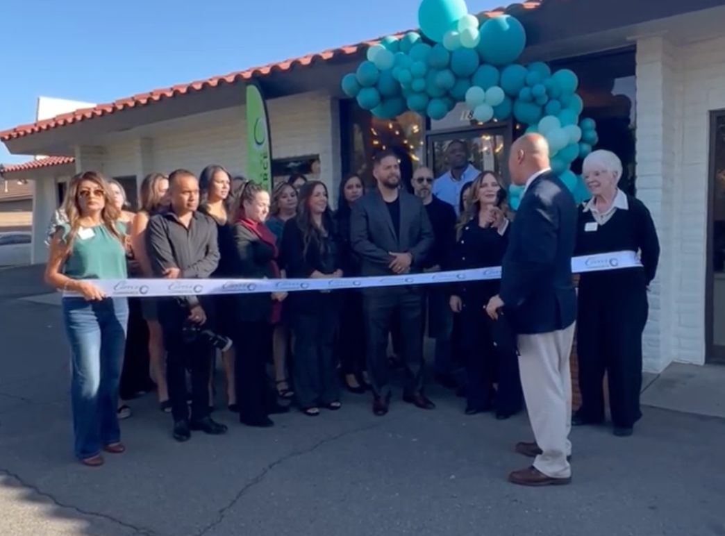 man speaking at ribbon cutting