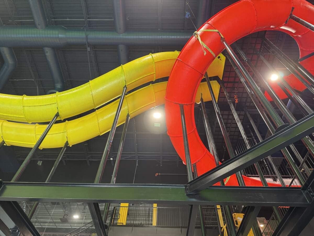 The new dry-slide action park in Colleyville features slides of all shapes and sizes including two 70-foot slides right in the lobby, which start on the third floor and slide down to the second.