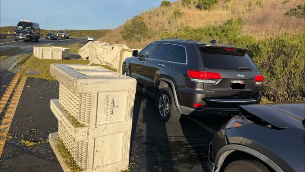 Several bins of grapes fell off a big rig truck traveling north on Highway 121 outside Schellville, causing a car crash and subsequent lane closures Sept. 9, 2026. (California Highway Patrol Napa)