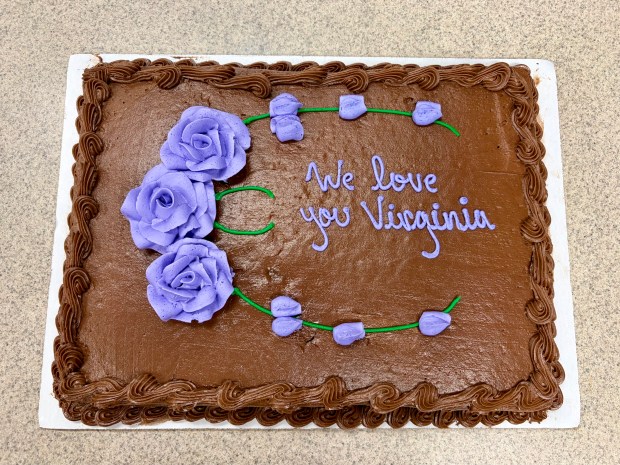 Attendees enjoyed cake during Virginia Greer's going away party on Saturday, Sept. 12. (Mallory Waligora, For The Oakland Press)