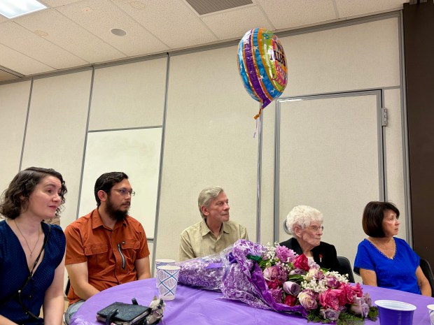 Virginia Greer sits with her family during a going away party for her on Saturday, Sept. 12. (Mallory Waligora, For The Oakland Press)