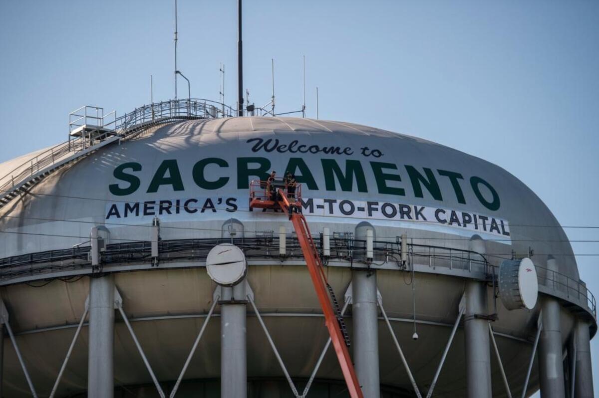 The 2017 rebranding of the Sacramento water tower as a farm-to-fork capital was executed in words too small for many motorists to read, the structure remaining in a dust of silver.