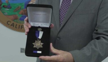 Retired officer honored with medal after deadly Highway 99 crash