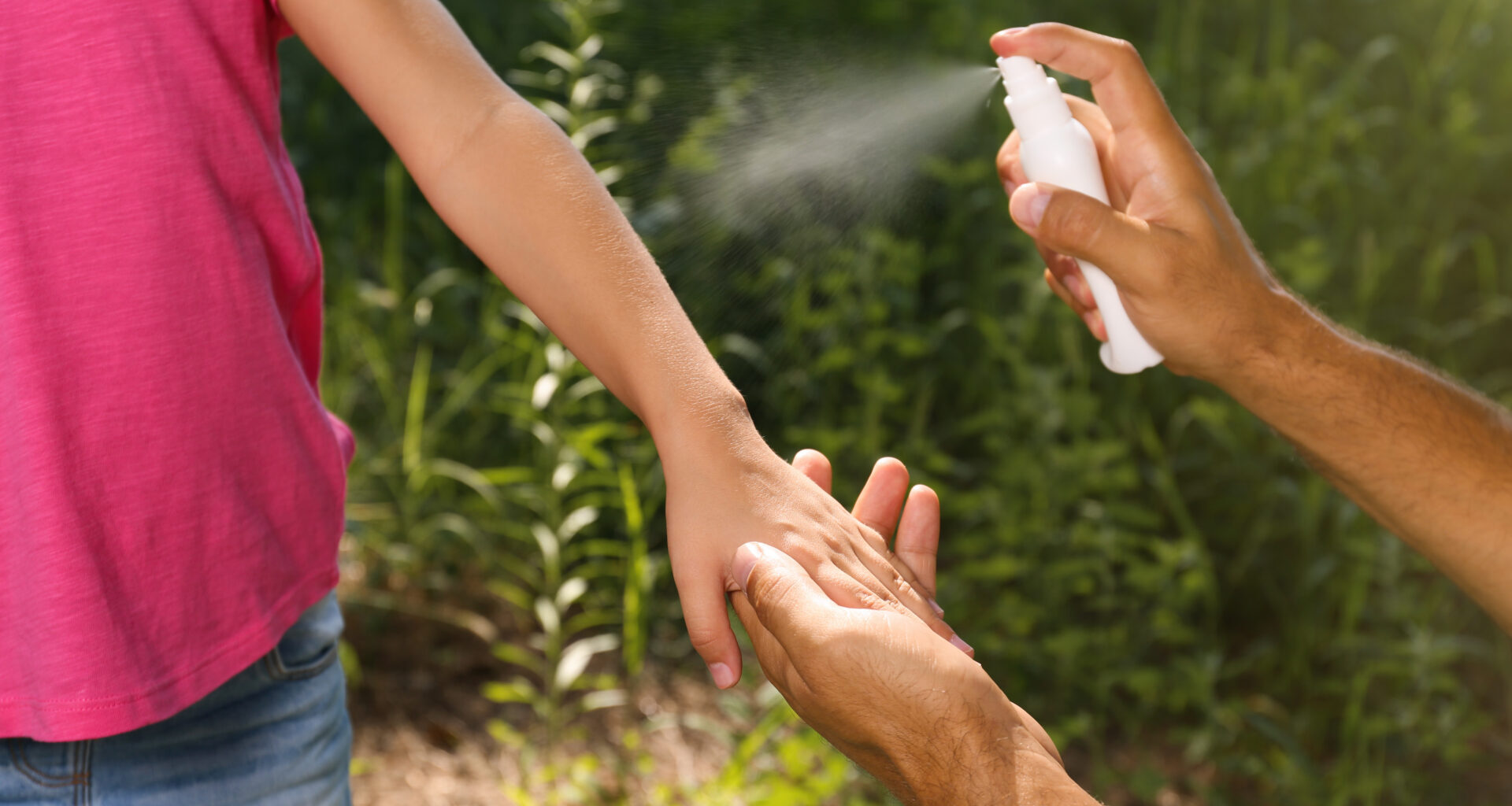 Hand spraying arm with bug repellent