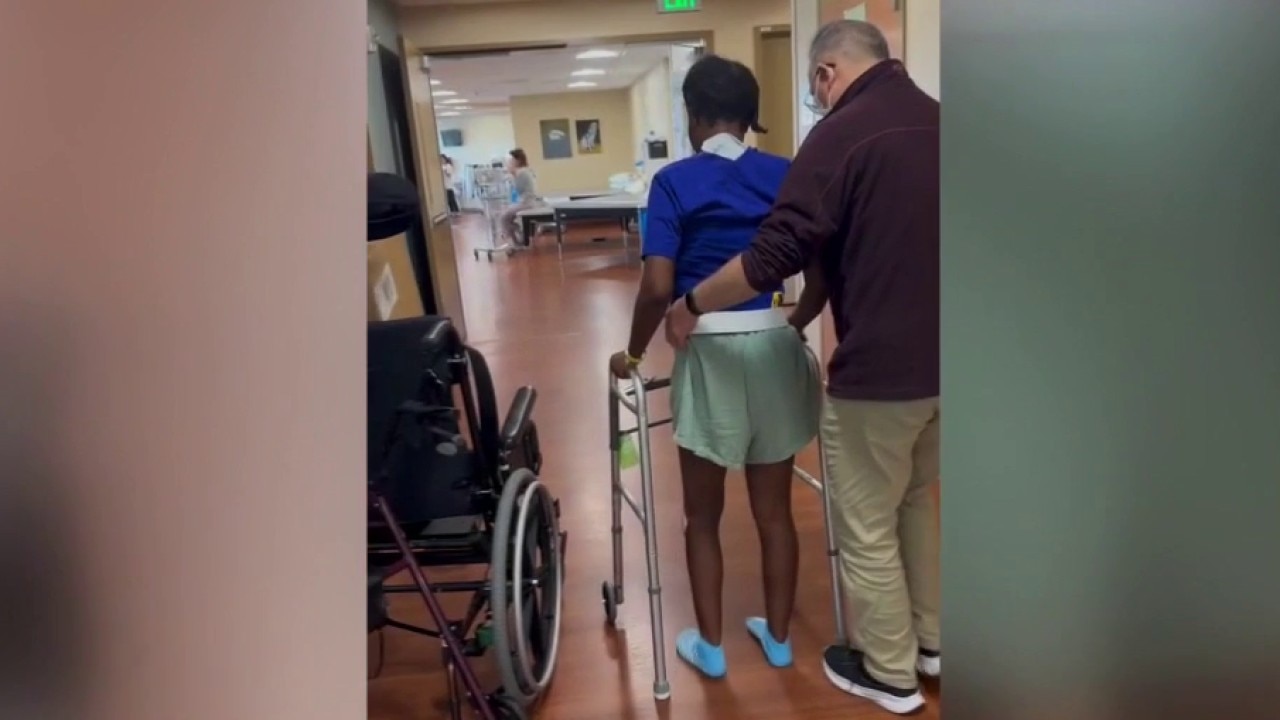 Oakland woman takes first steps one month after crash involving kid drivers