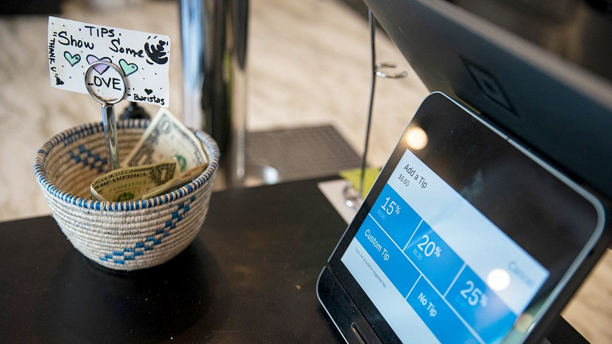 Square payment device on counter at coffee shop in Washington, D.C.