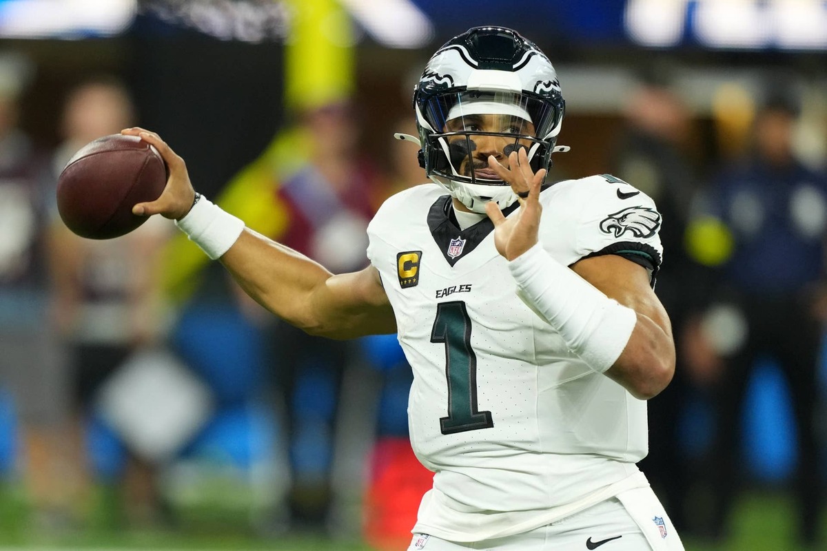  Dec 8, 2025; Inglewood, California, USA; Philadelphia Eagles quarterback Jalen Hurts (1) passes against the Los Angeles Chargers in the first half at SoFi Stadium. Mandatory Credit: Kirby Lee-Imagn Images 