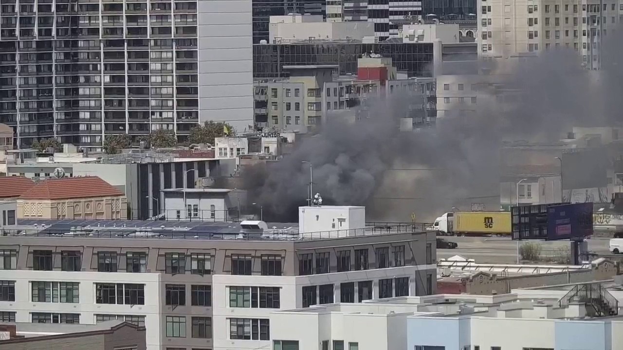 Large fire burns in Downtown Oakland near Webster, 6th Street