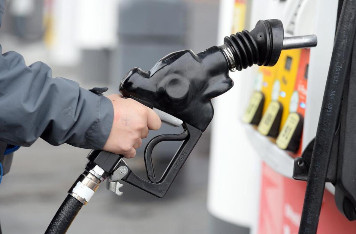 Kou Vue of Fresno pumps gas at a Shell gas station on McKinley and Peach avenues in Fresno. Regular gasoline cost about $6.39 per gallon on average as of Monday, Sept. 28, 2026.