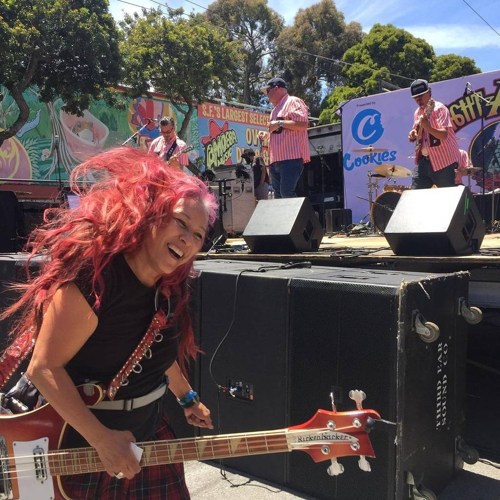 Person performing at the Haight Ashbury Street fair in SF