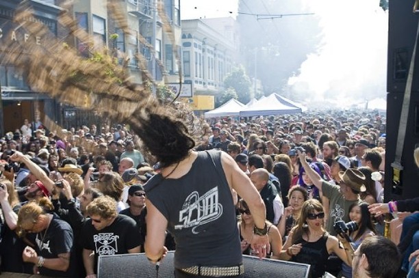 A person performing at the Haight Ashbury Street