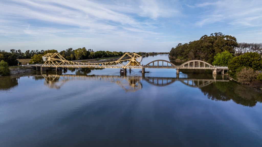Aerial view of the Isleton Bridge crossing the Sacramento River in California.