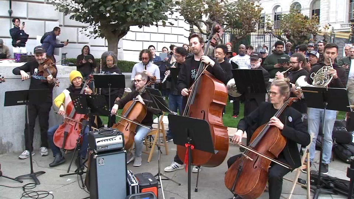 San Francisco Opera Orchestra musicians perform outside amid historic strike