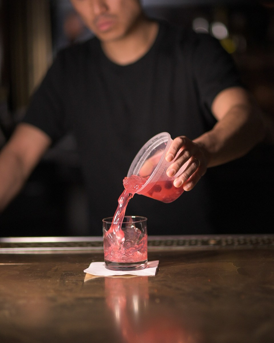 Pouring a DIY cocktail at Employees Only.