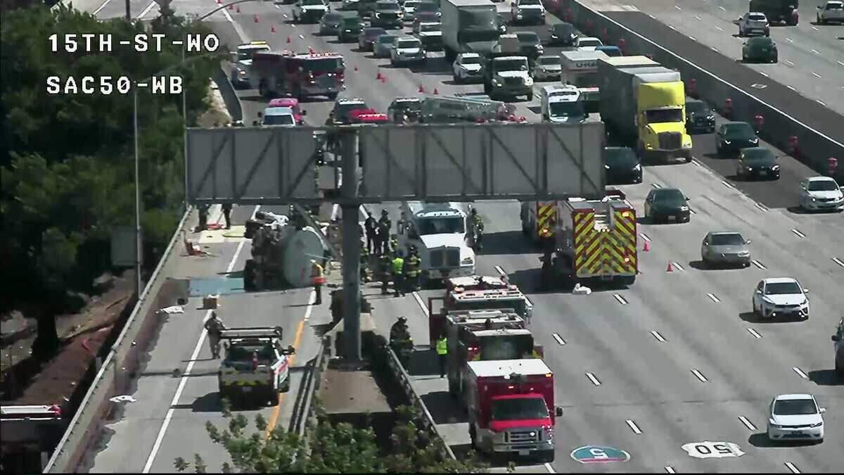 Emergency crews respond Wednesday to an overturned tanker truck on westbound Highway 50 near 15th Street in Sacramento. The crash spilled fuel and prompted lane and ramp closures on the W-X portion of the freeway. Emergency crews respond Wednesday to an overturned tanker truck on westbound Highway 50 near 15th Street in Sacramento. The crash spilled fuel and prompted lane and ramp closures on the W-X portion of the freeway.