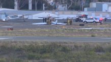 Emergency personnel respond to a plane crash at Montgomery-Gibbs Executive Airport on Sept. 7, 2026. (NBC 7 San Diego)