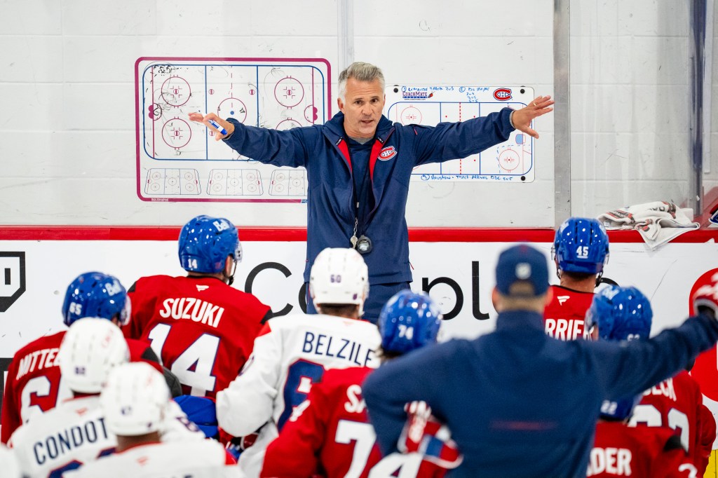 Montreal Canadiens head coach Martin St. Louis instructs players during the NHL hockey team's training camp in Brossard, Quebec, Thursday, Sept. 17, 2026.