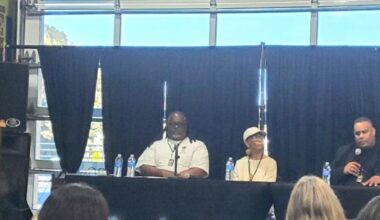 Quixote Atkins of VillageGIVE moderates a panel discussion at the Coliseum 60 celebration at Youth UpRising featuring Keith Brown, a member of IATSE Local 107; author, historian and former Black Panther Party member Tareka Lewis; and African American Sports and Entertainment Group President Ray Bobbitt.