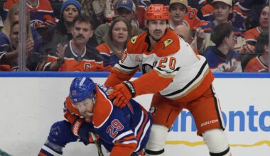Edmonton Oilers Leon Draisaitl (29) is pushed to the ice by Anaheim Ducks Chris Kreider (20) during the second period of game 5 in the first round of an NHL hockey Stanley Cup playoff series on Tuesday, April 28, 2026 in Edmonton. Greg Southam-Postmedia