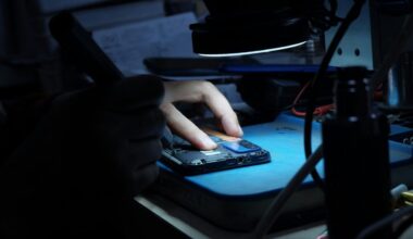 Technician fixes cellphone