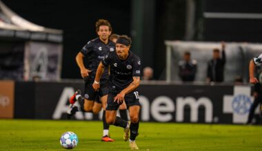 Alameda Post - Oakland Roots soccer playes with the ball