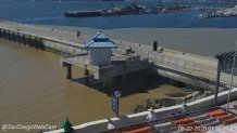Some of the water in the San Diego Bay near Tuna Harbor Dockside Market began turning brown on Sept. 22, 2026. (SanDiegoWebCam)