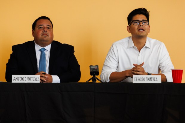 San Diego, California - Antonio Martinez, longtime San Ysidro school board trustee, and Gerardo Ramirez, chief of staff of termed-out incumbent Vivian Moreno, speak during a candidate forum for the District 8 seat on the San Diego City Council at the Otay Mesa-Nestor Library in Otay Mesa West on Wednesday, Sept. 9, 2026. (Kristian Carreon / The San Diego Union-Tribune)