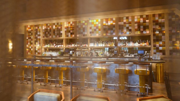 At The Guild Hotel in downtown San Diego on Tuesday, Sept. 1, 2026, is the newly redesigned bar with stained glass panels behind it and a custom see-thru curtain that can be closed to create a separate space.