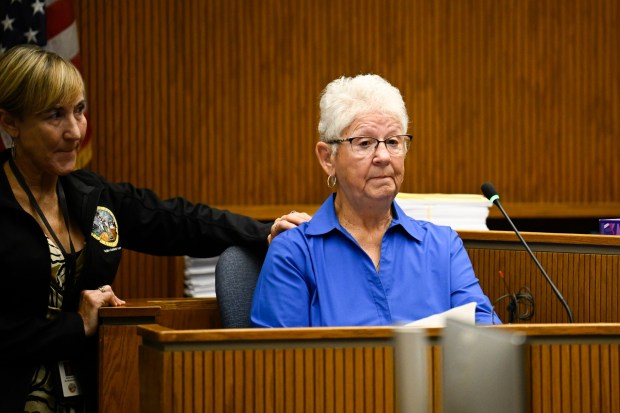 Lorena Marodi, mother of victim, Rebecca Morodi, reads her impact statement as victim advocate Wendi Volpp looks during a sentencing hearing for Yolanda Marodi in San Diego County Superior Court Sept. 2, 2026 in El Cajon, Calif. (Photo by Denis Poroy)