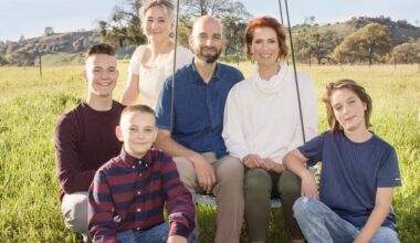 family photo with a mother, father and four children