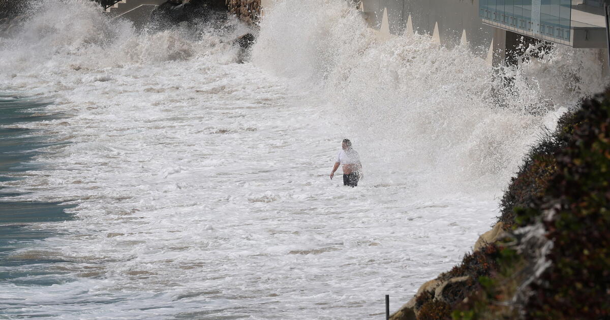 L.A. hit by rare September rain, coastal flooding from Hurricane Marie