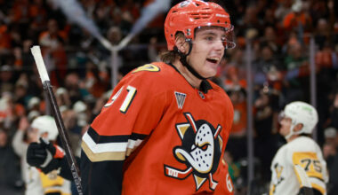 ANAHEIM, CALIFORNIA - OCTOBER 14: Leo Carlsson #91 of the Anaheim Ducks celebrates a goal scored by Chris Kreider #20 during the third period against the Pittsburgh Penguins at Honda Center on October 14, 2025 in Anaheim, California.