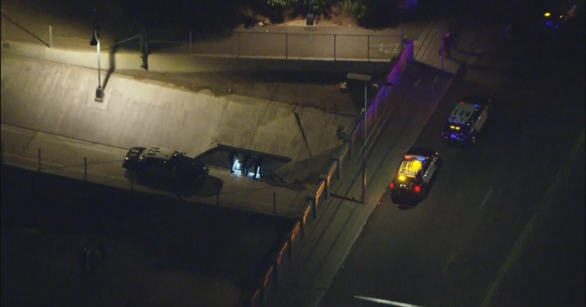 Armed suspect runs into Winnetka storm drain while running from police