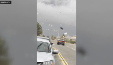 Possible landspout sends Victorville trash cans and debris flying