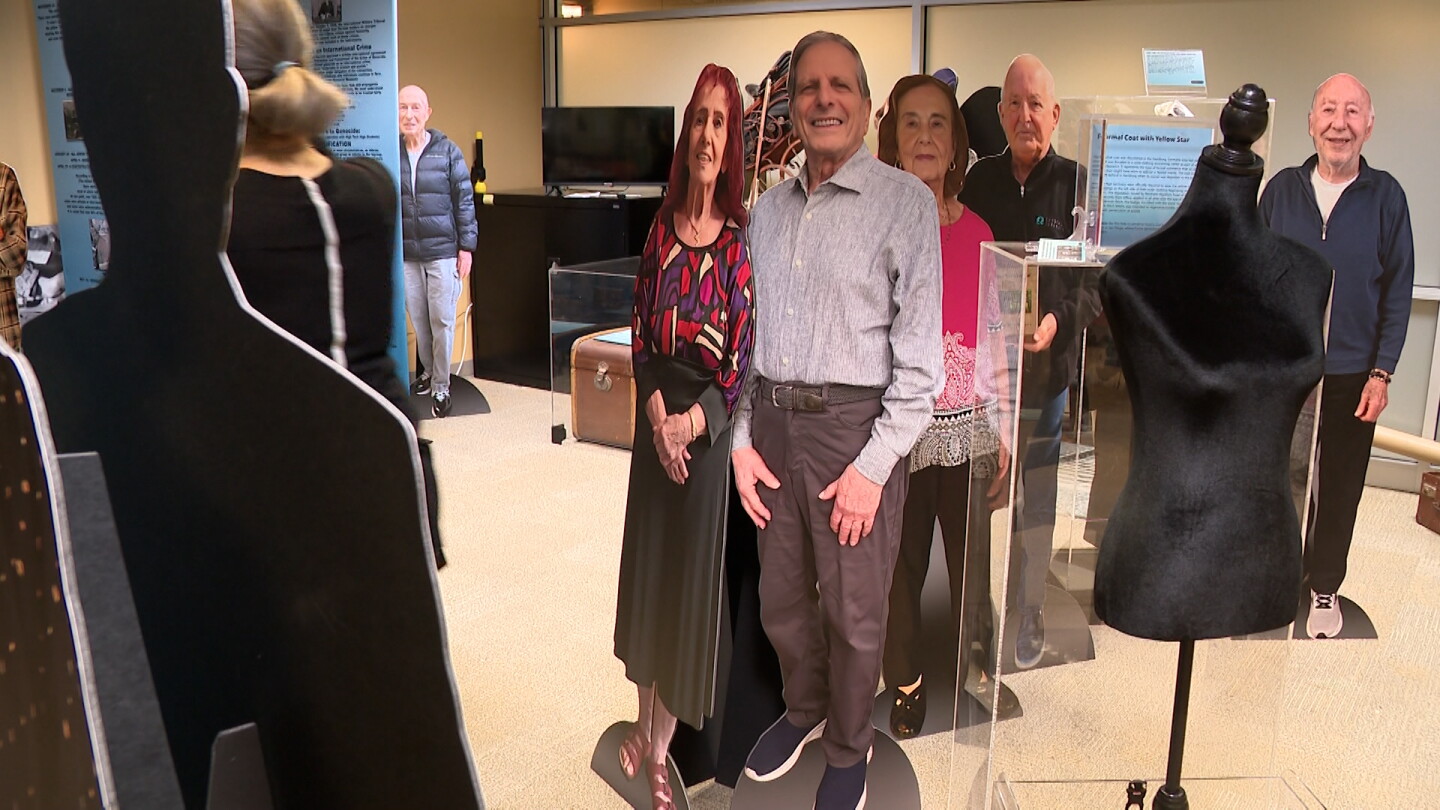 Cutouts depicting survivors of the Holocaust are shown at the RUTH exhibit at the Central Library on Sept. 8, 2026.
