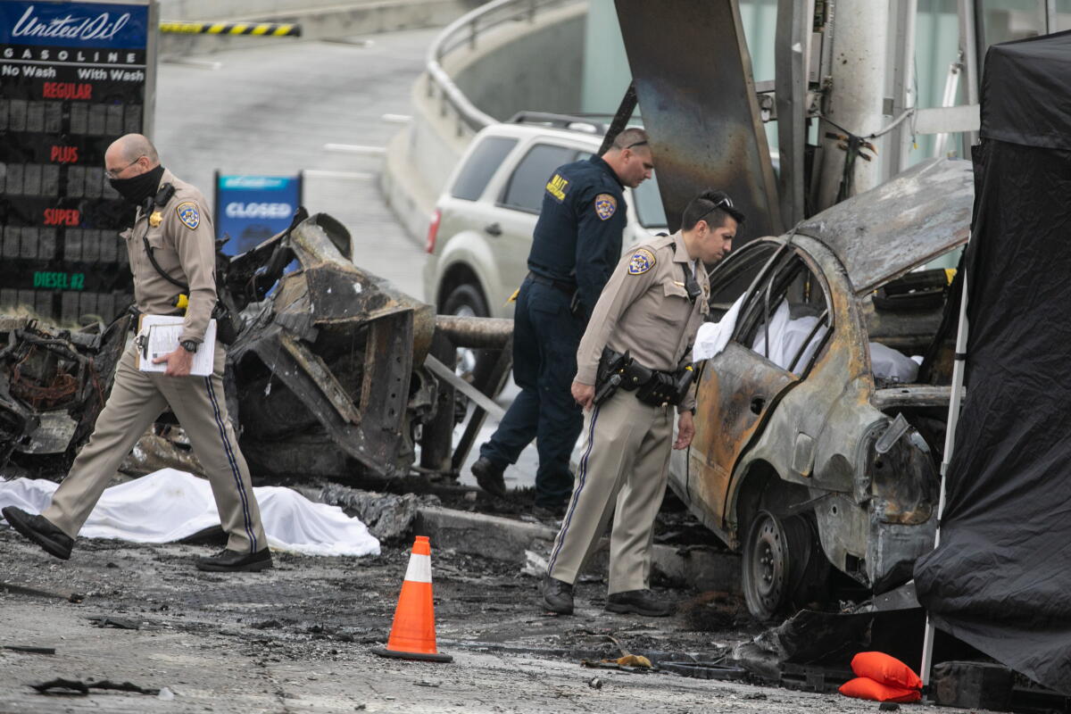 CHP and other officials investigate a fiery crash where multiple people were killed