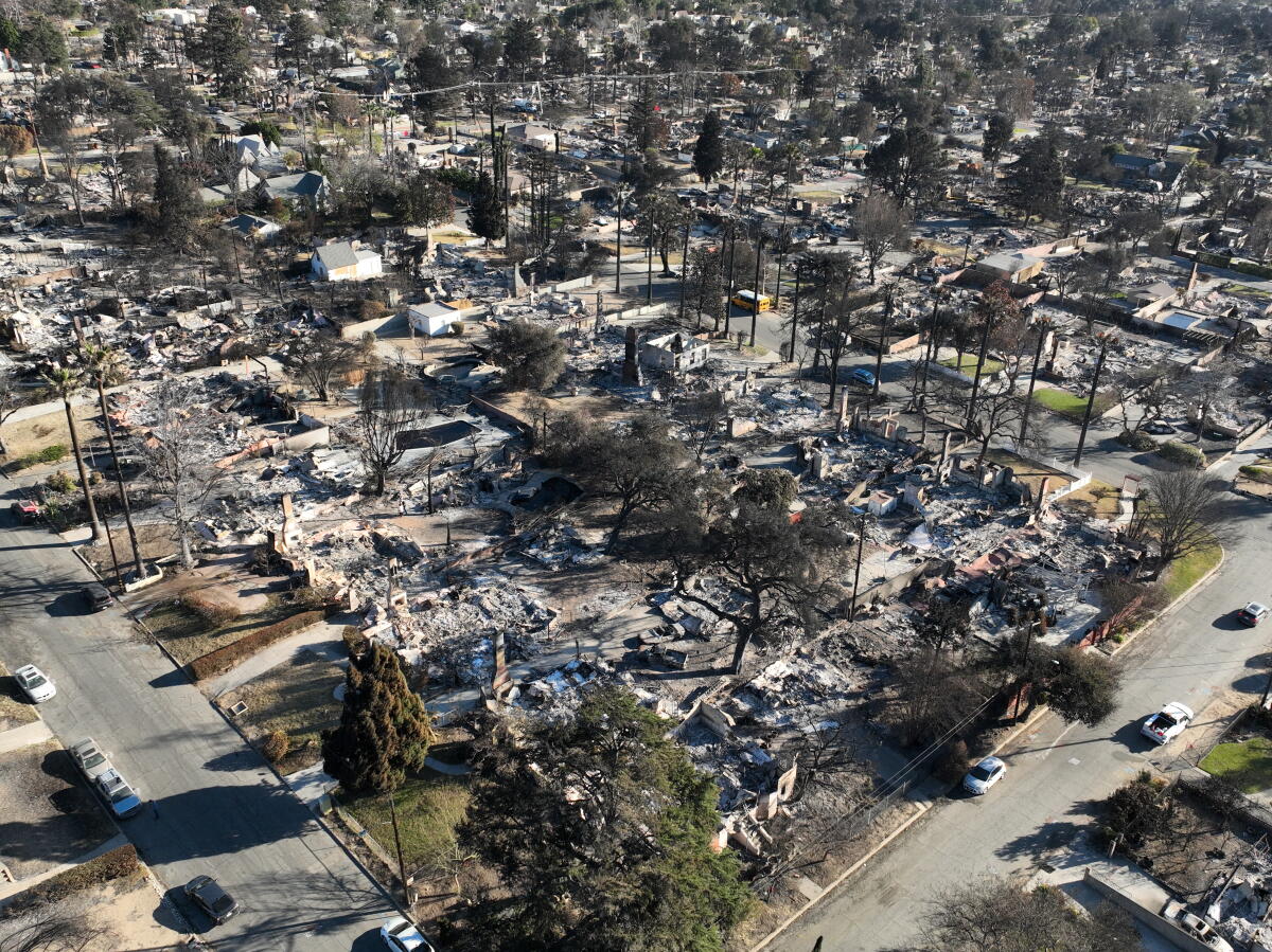 An aerial view of thousands of burned homes and businesses.
