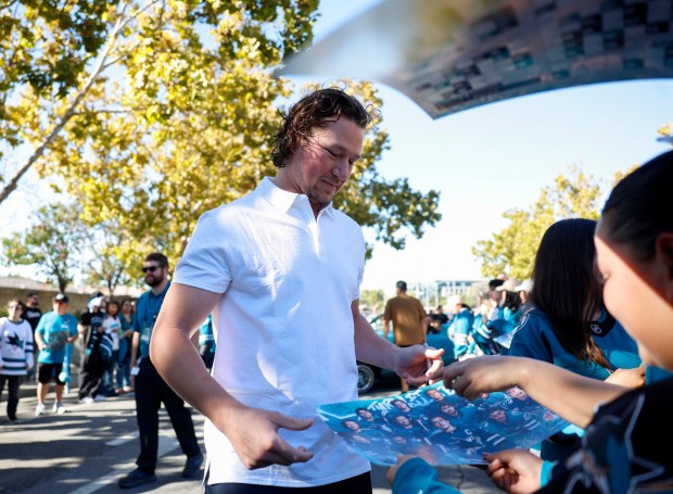 San Jose Sharks' Tyler Toffoli (73) signs autographs during the Teal Carpet arrivals before their first home game against the Florida Panthers at the SAP Center in San Jose, Calif., on Thursday, Oct. 1, 2026. (Nhat V. Meyer/Bay Area News Group)