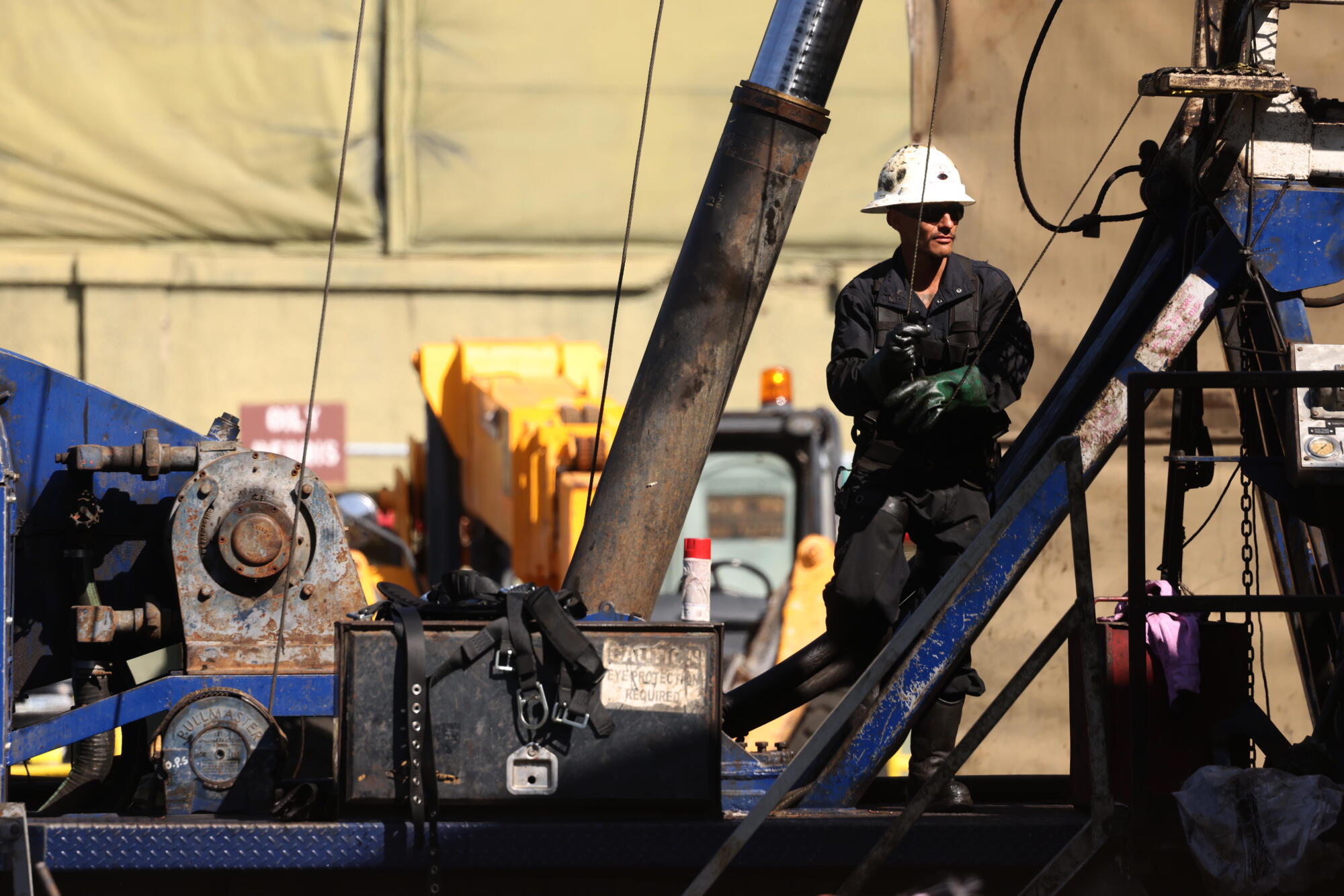 Warning signs at the main gate of the Murphy drill site.