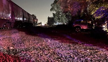 Man hospitalized after vehicle struck by train in Fresno