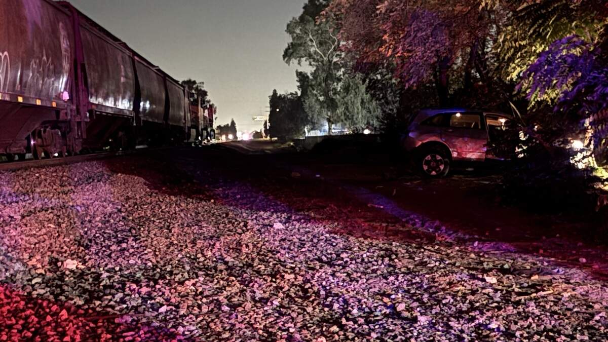 Man hospitalized after vehicle struck by train in Fresno