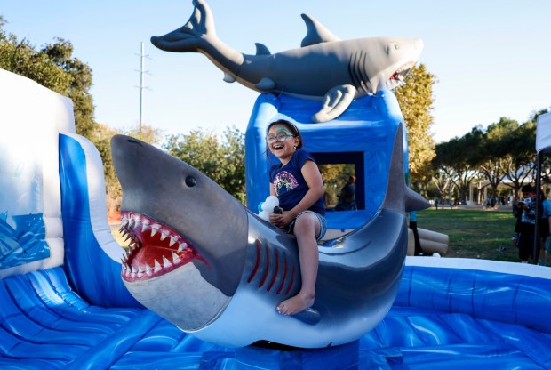 Rexy, 8, from San Jose, rides a shark ride during opening day festivities at the SAP Center in San Jose, Calif., on Thursday, Oct. 1, 2026. (Nhat V. Meyer/Bay Area News Group)