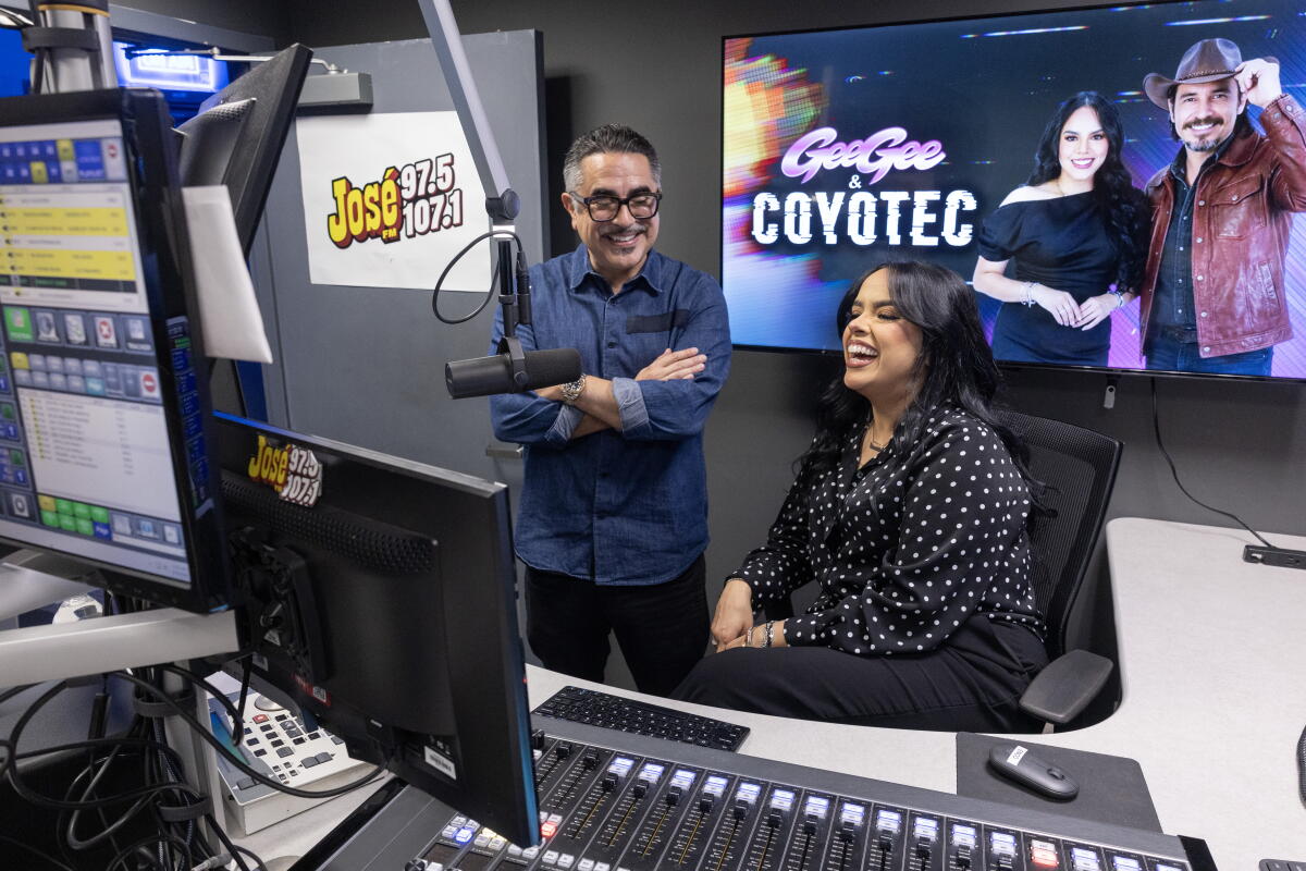 Entravision executive Eduardo Maytorena and Geraldine "GeeGee" Guzman in the studio at José 97.5 FM in Burbank