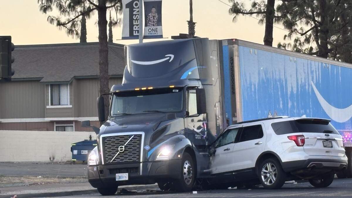 SUV collides with Amazon semi after turn in Fresno