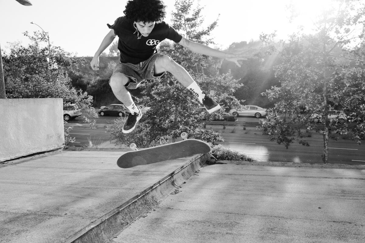 A skater performing an ollie kickflip