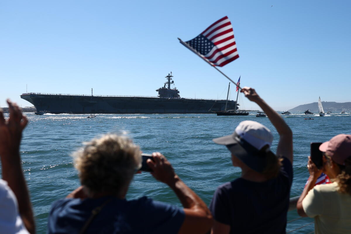 The USS Abraham Lincoln aircraft carrier returns to the San Diego Bay