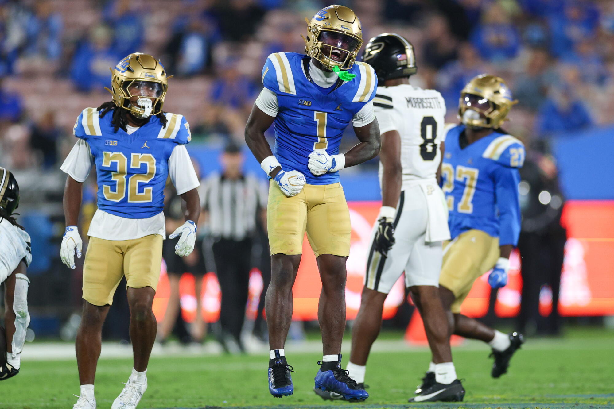 UCLA defensive back Scooter Jackson celebrates after making a defensive stop against Purdue on Sept. 19.