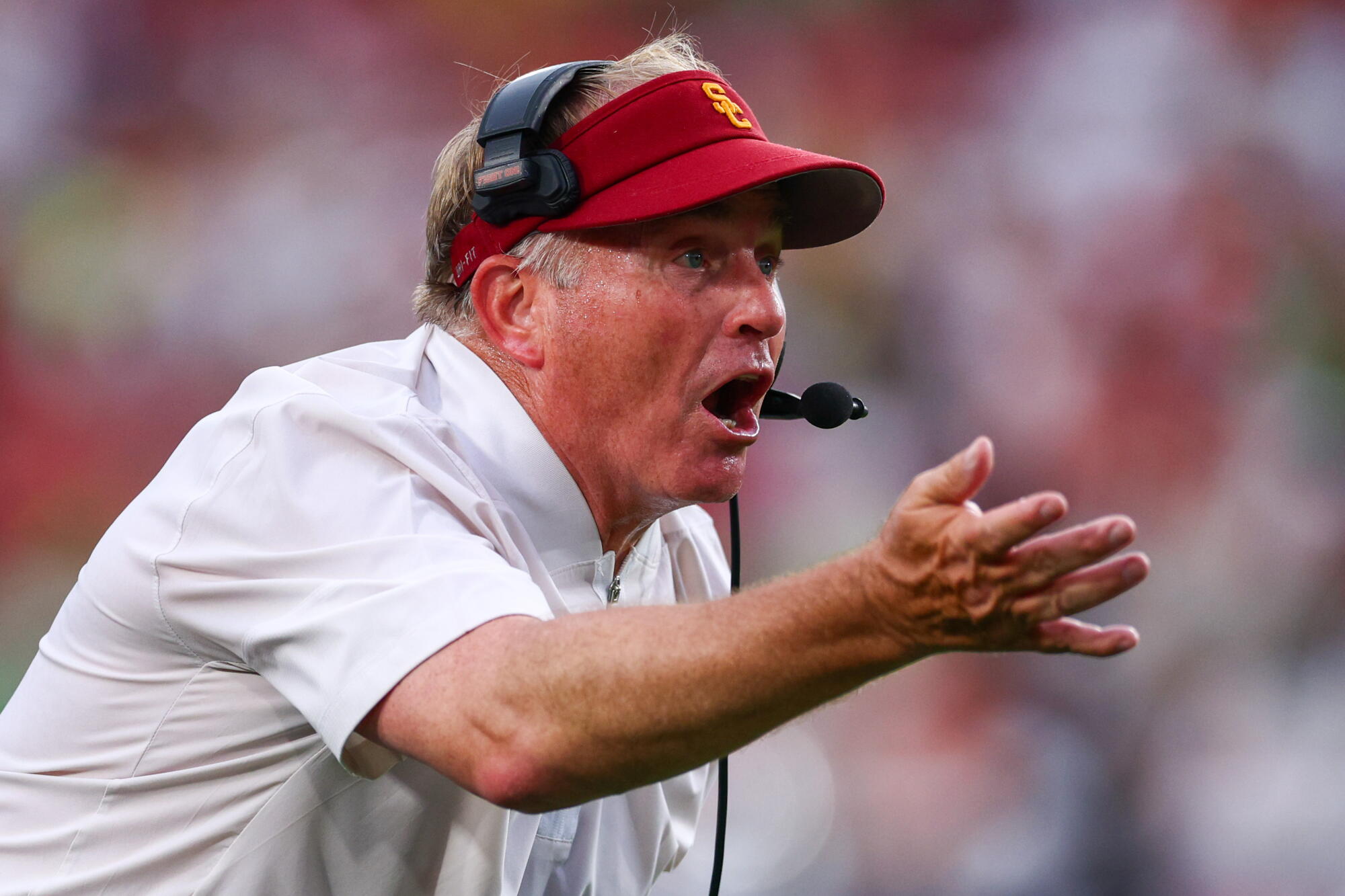 USC defensive coordinator Gary Patterson shouts instructions at his players during the Trojans' loss to Oregon.