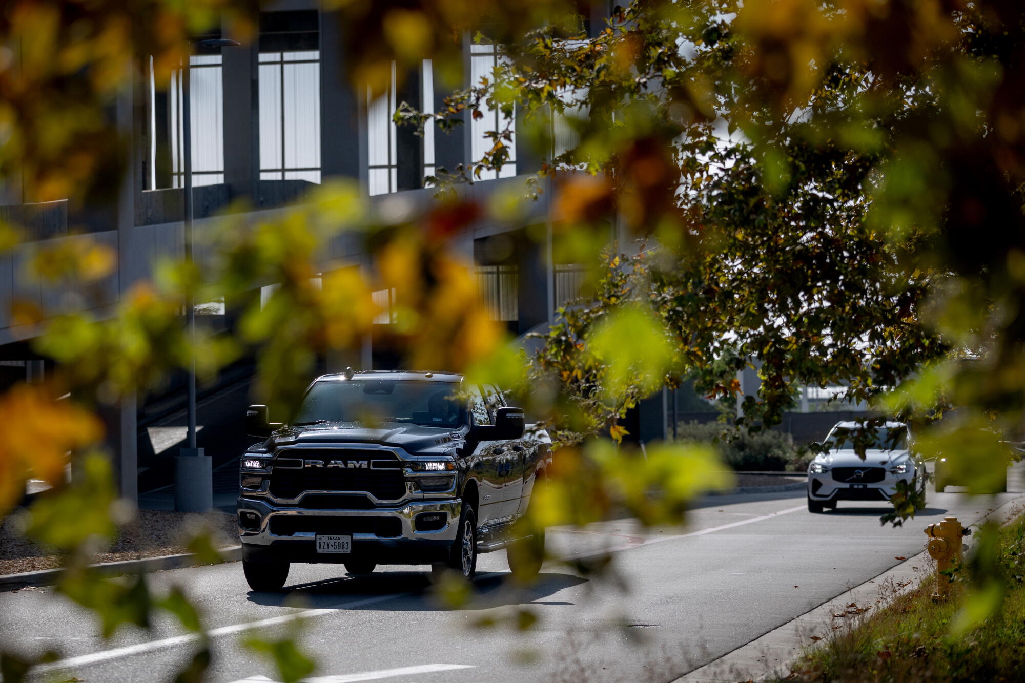 A Dodge Ram pick up truck leaves the LAX Rental Car Center