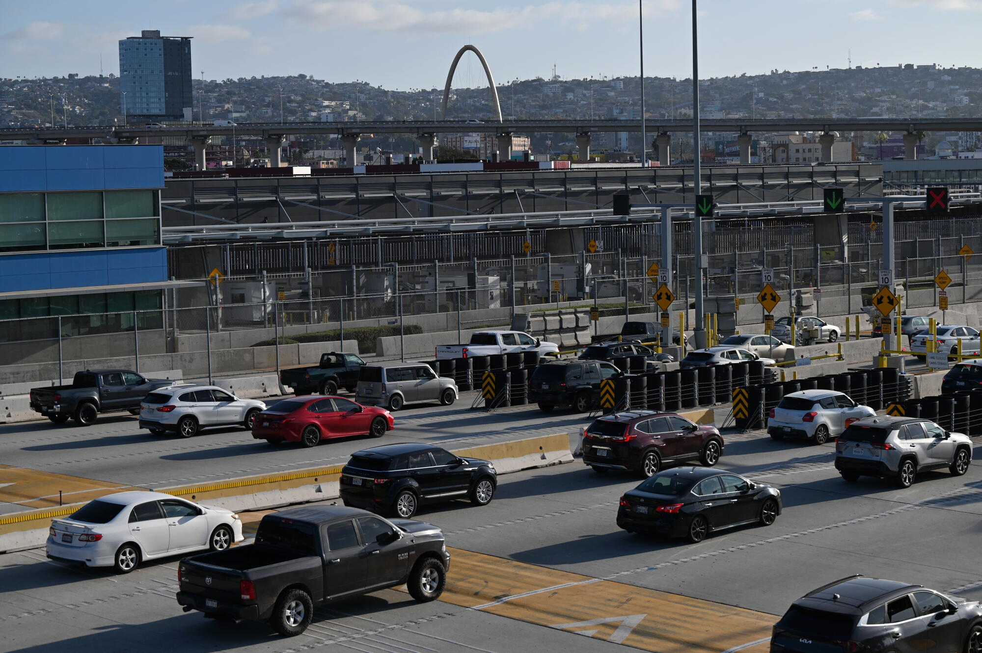 Vehicles cross into Tijuana, Mexico from San Diego, Calif.